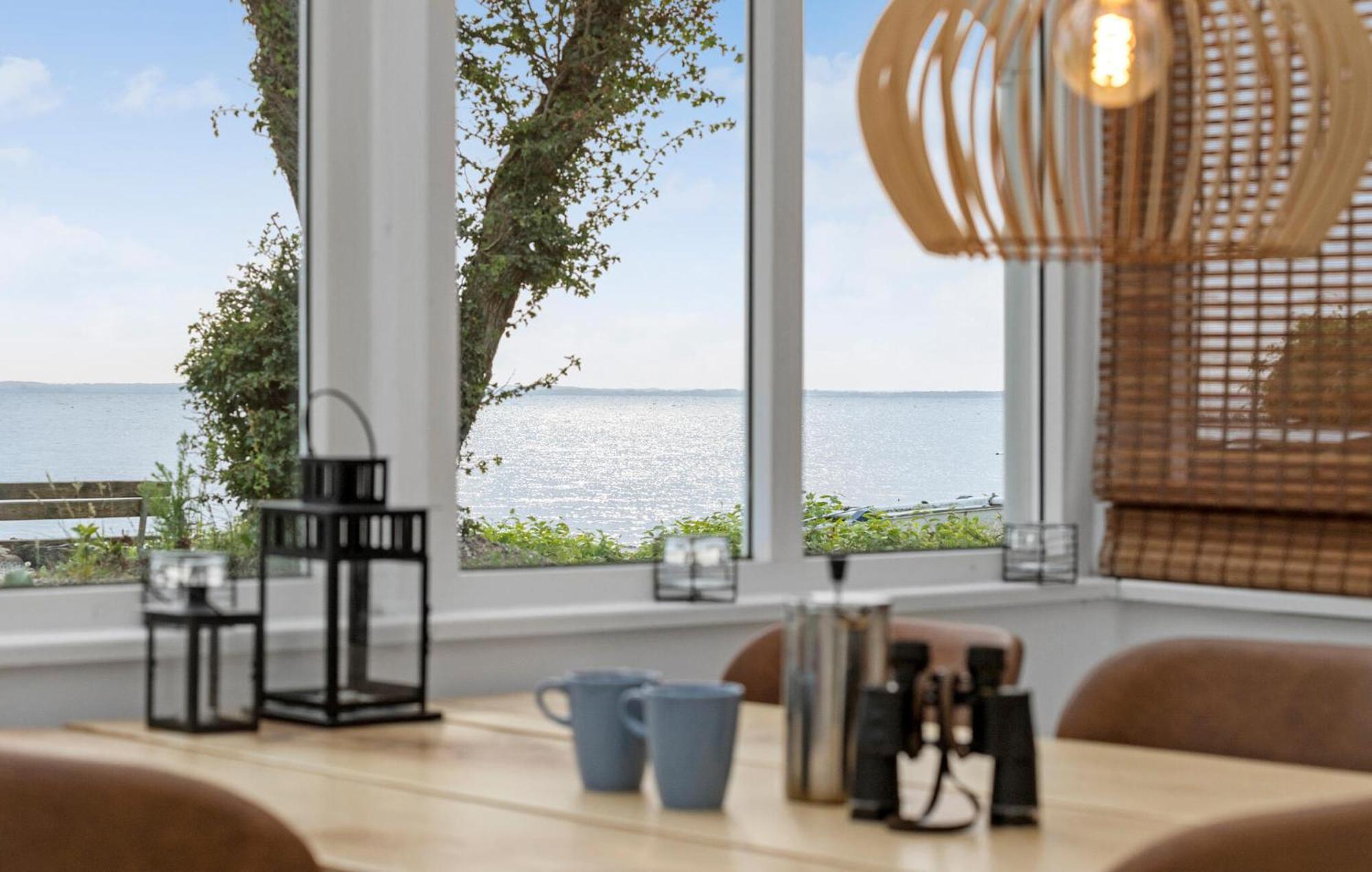 Beach Front Home In Sjolund With Kitchen Exterior photo